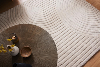 Quel tapis mettre sous une table ronde ?