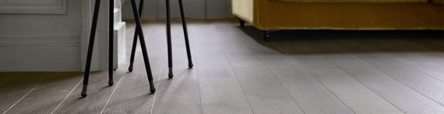 Quelle est la différence entre le parquet et le stratifié?